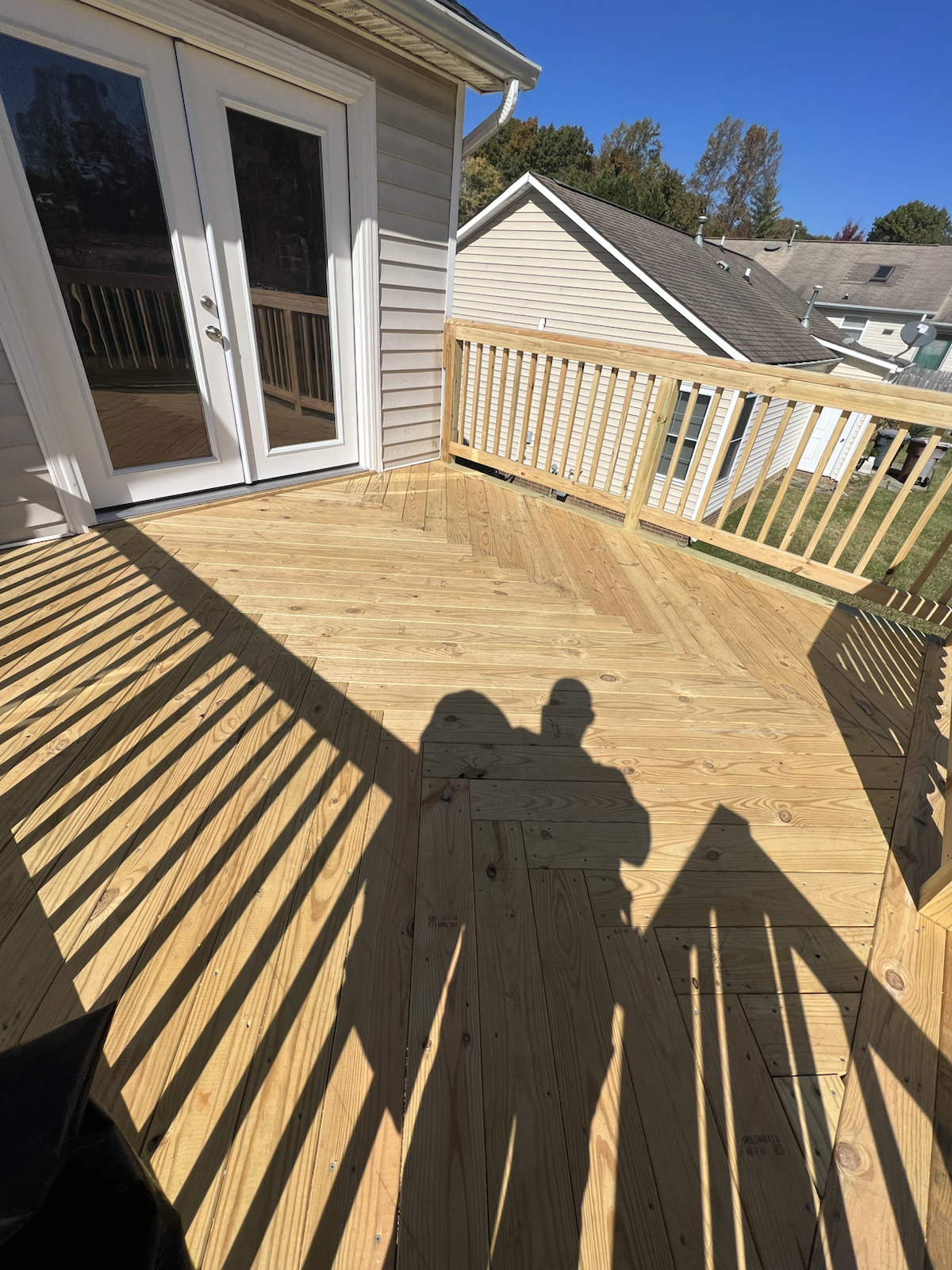 New deck surface in progress during exterior rebuild by Marco's Home Improvement & Remodeling